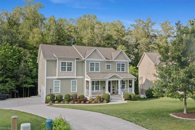 7935 Patriots Landing Pl, Quinton, VA 23141 - view of front of house featuring covered porch, concrete driveway, a front lawn, and a garage