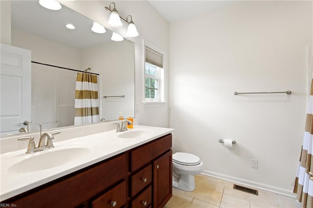 full bath with toilet, double vanity, tile patterned flooring, baseboards, and a shower with curtain