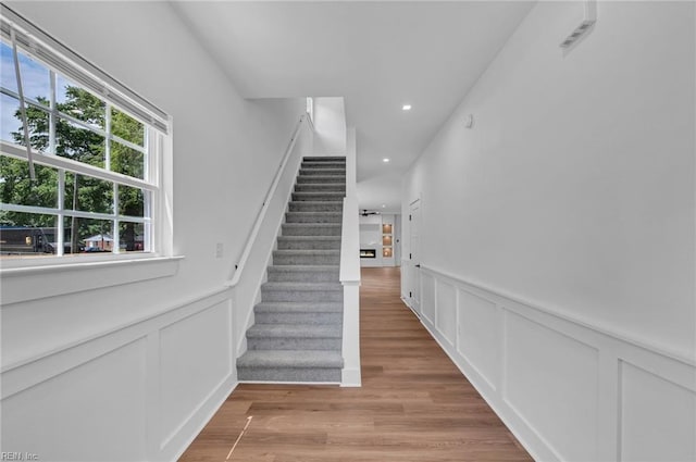 20 Kimberly Ave, Hampton, VA 23663 - staircase featuring a decorative wall, a wainscoted wall, wood finished floors, and recessed lighting