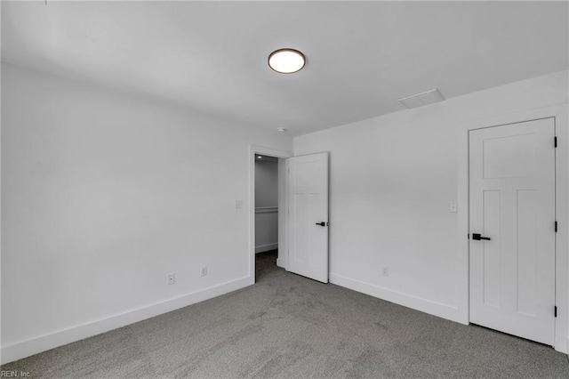 20 Kimberly Ave, Hampton, VA 23663 - unfurnished bedroom with carpet flooring, baseboards, and a spacious closet