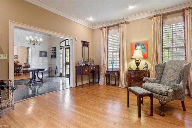 111 Riverside Dr, Suffolk, VA 23435 - living area with a chandelier, wood finished floors, and ornamental molding