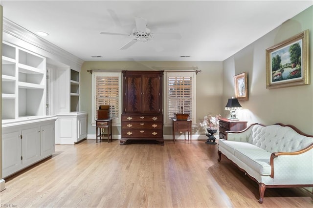 111 Riverside Dr, Suffolk, VA 23435 - living area featuring a ceiling fan, light wood-style floors, and baseboards