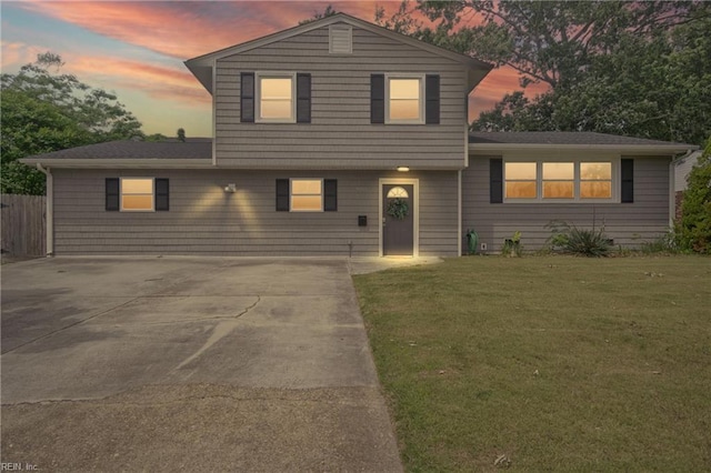 split level home featuring driveway