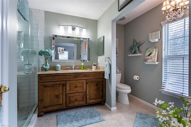 455 Fairway Lookout, Williamsburg, VA 23188 - bathroom with tile patterned flooring, toilet, a shower stall, vanity, and a textured ceiling