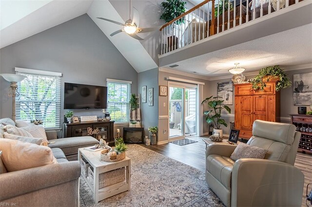455 Fairway Lookout, Williamsburg, VA 23188 - living area featuring wood finished floors, ceiling fan, high vaulted ceiling, and crown molding