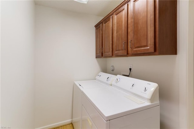 200 Tabb Smith Trl, Yorktown, VA 23693 - washroom featuring washing machine and dryer, cabinet space, and baseboards