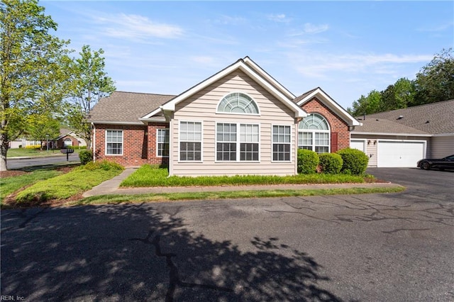 200 Tabb Smith Trl, Yorktown, VA 23693 - single story home featuring asphalt driveway, brick siding, and a garage