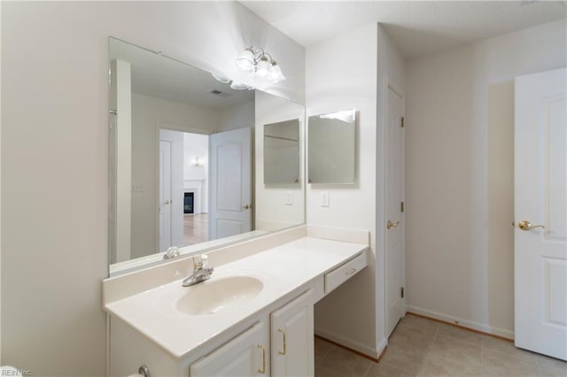 200 Tabb Smith Trl, Yorktown, VA 23693 - bathroom featuring vanity, tile patterned flooring, and baseboards