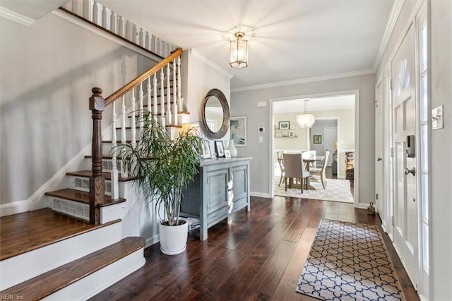 232 Cedar Rd, Poquoson, VA 23662 - foyer entrance with wood-type flooring, stairway, a chandelier, ornamental molding, and baseboards