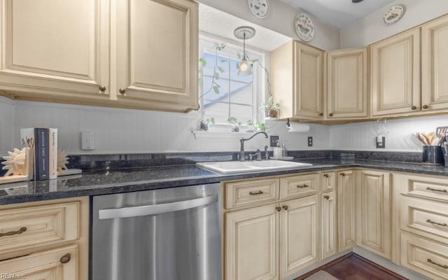 5009 Meadow Pines Pl, Virginia Beach, VA 23464 - kitchen with stainless steel dishwasher, cream cabinets, a sink, dark stone countertops, and decorative light fixtures