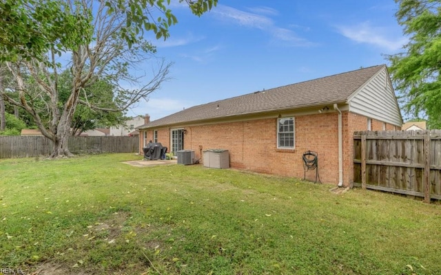 5009 Meadow Pines Pl, Virginia Beach, VA 23464 - back of house featuring brick siding and central AC unit