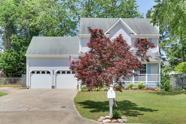 view of front facade featuring concrete driveway, an attached garage, covered porch, and a shingled roof