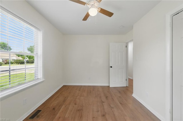 155 Colony Rd, Newport News, VA 23602 - spare room featuring wood finished floors, plenty of natural light, baseboards, and a ceiling fan