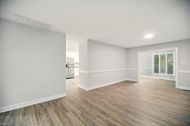 38 Yeardleys Grant, Williamsburg, VA 23185 - spare room featuring wood finished floors and baseboards