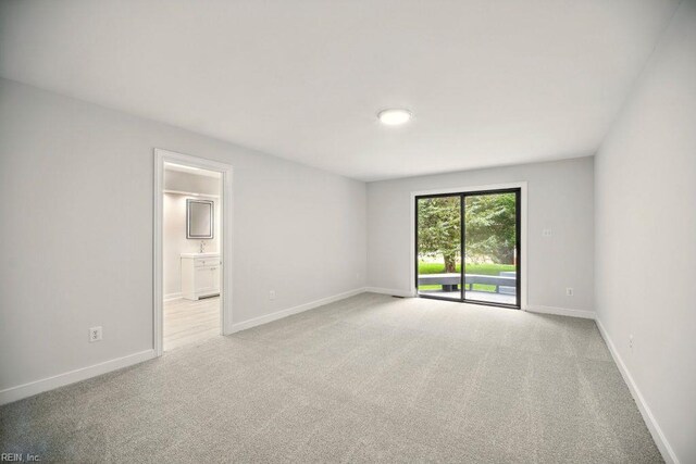 38 Yeardleys Grant, Williamsburg, VA 23185 - empty room featuring light colored carpet and baseboards