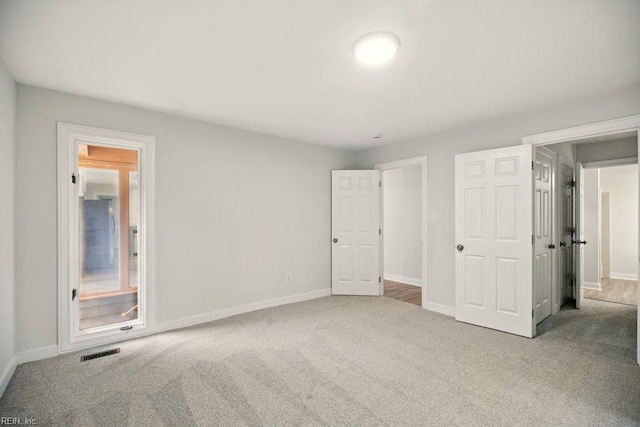 38 Yeardleys Grant, Williamsburg, VA 23185 - unfurnished bedroom with carpet and baseboards