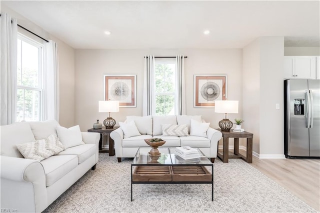 268 Tern Ave, Portsmouth, VA 23701 - living room featuring light wood-style flooring, baseboards, and recessed lighting