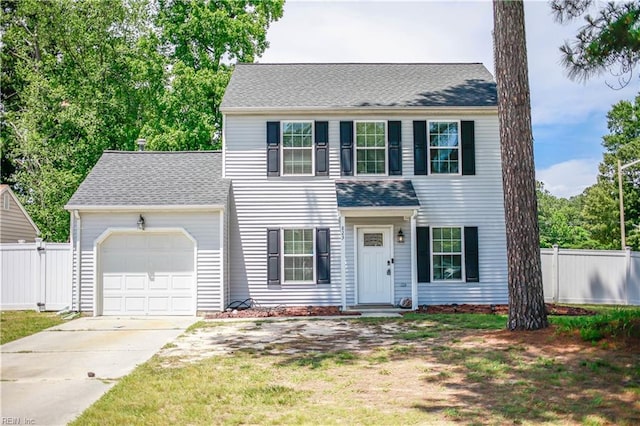 823 Jessie Cir, Newport News, VA 23608 - colonial-style house with an attached garage, driveway, and roof with shingles