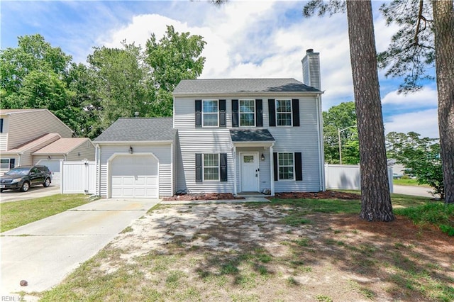 823 Jessie Cir, Newport News, VA 23608 - colonial inspired home with a chimney, an attached garage, and concrete driveway