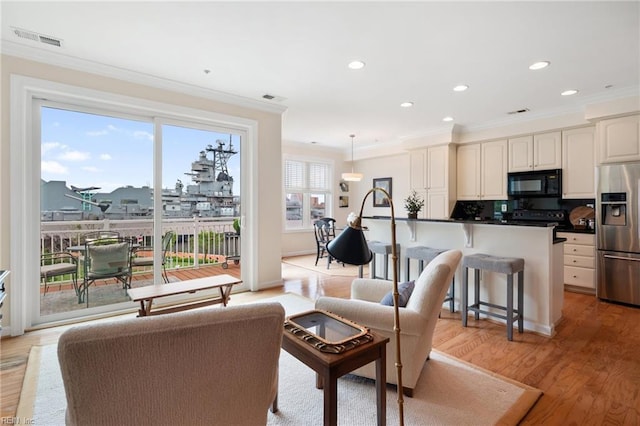239 Duke St Unit 408, Norfolk, VA 23510 - living room featuring ornamental molding, light wood finished floors, and recessed lighting