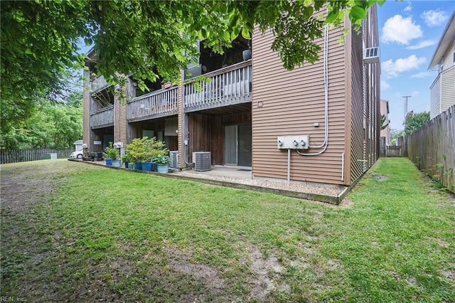 8530 Tidewater Dr Unit 111, Norfolk, VA 23503 - rear view of property with central AC unit