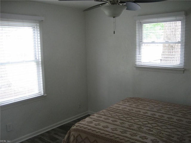 3213 Northgate Dr, Virginia Beach, VA 23452 - bedroom with dark wood-style floors, baseboards, and a ceiling fan