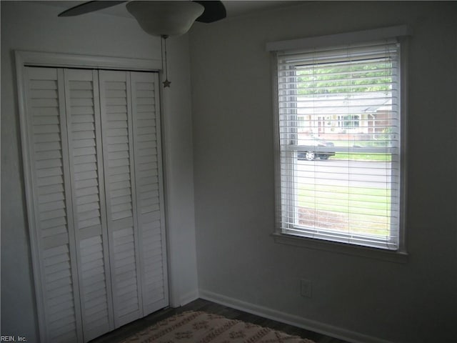 3213 Northgate Dr, Virginia Beach, VA 23452 - unfurnished bedroom featuring multiple windows, a closet, baseboards, and ceiling fan