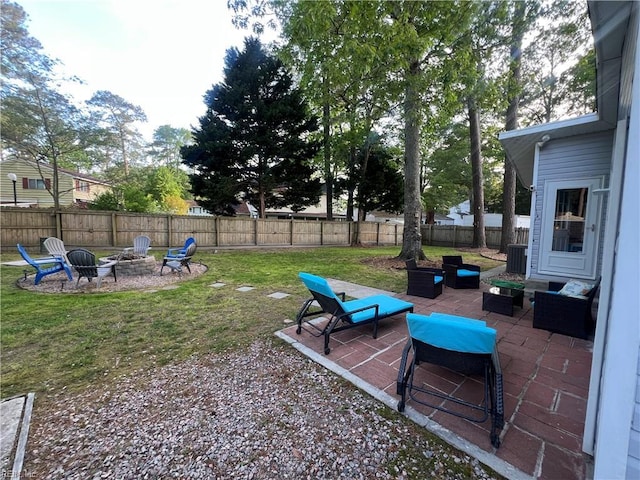 3213 Northgate Dr, Virginia Beach, VA 23452 - view of yard featuring an outdoor fire pit, a patio area, and central AC unit