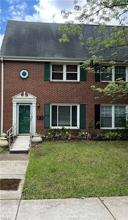 3309 Weeping Willow Ln, Virginia Beach, VA 23453 - view of property featuring brick siding, a front yard, and a shingled roof