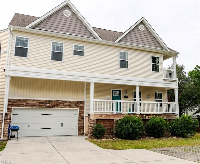 3216 Pretty Lake Ave Unit B, Norfolk, VA 23518 - view of front of property with a porch, stone siding, a garage, driveway, and roof with shingles