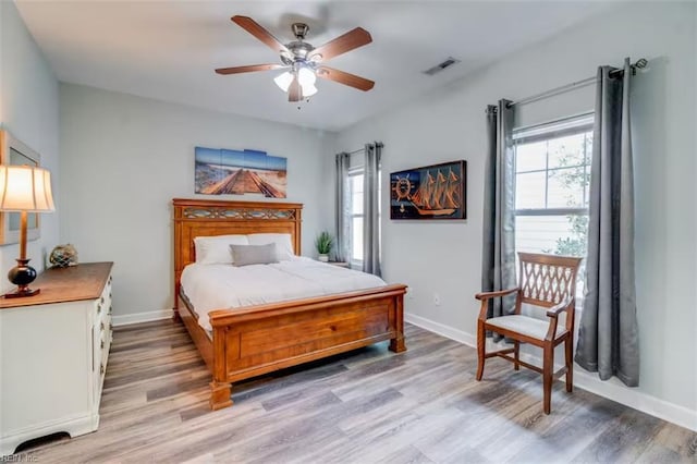 3216 Pretty Lake Ave Unit B, Norfolk, VA 23518 - bedroom with multiple windows and light wood-type flooring