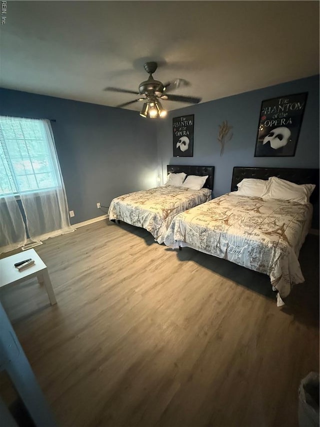 517 Lanier Cres, Portsmouth, VA 23707 - bedroom with wood finished floors, baseboards, and a ceiling fan