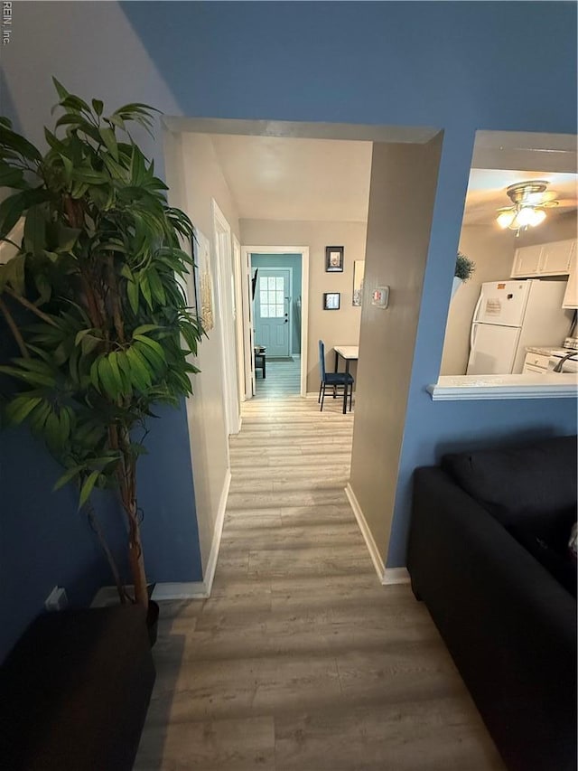 517 Lanier Cres, Portsmouth, VA 23707 - hallway with light wood-style flooring and baseboards