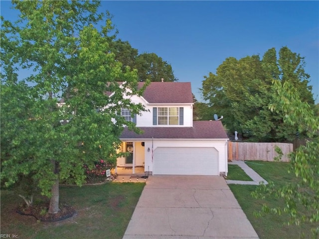 3121 Amador Dr, Virginia Beach, VA 23456 - traditional-style house with concrete driveway and an attached garage