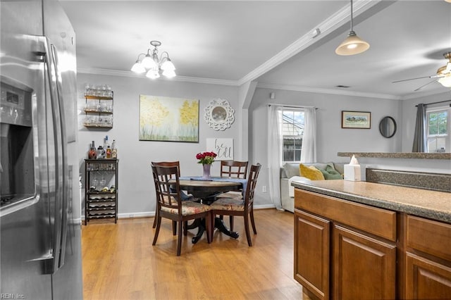 1812 Bancroft Dr, Hampton, VA 23663 - dining space featuring light wood-type flooring, a chandelier, crown molding, baseboards, and ceiling fan