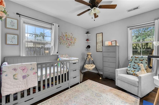 1812 Bancroft Dr, Hampton, VA 23663 - bedroom with multiple windows, dark wood-style flooring, and a ceiling fan