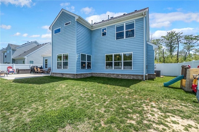 rear view of house featuring a patio area and central AC unit