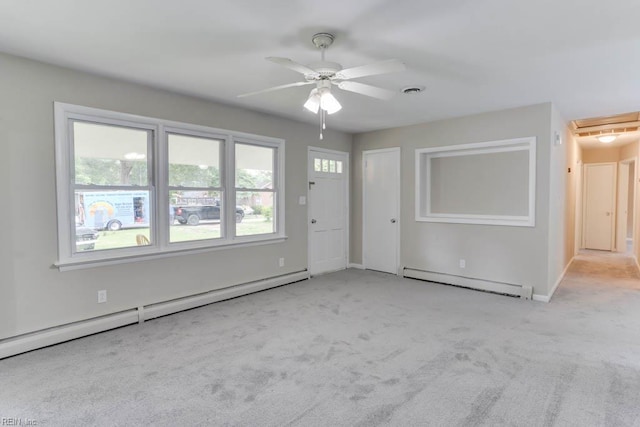 carpeted foyer entrance featuring a baseboard radiator, a baseboard heating unit, a ceiling fan, and baseboards