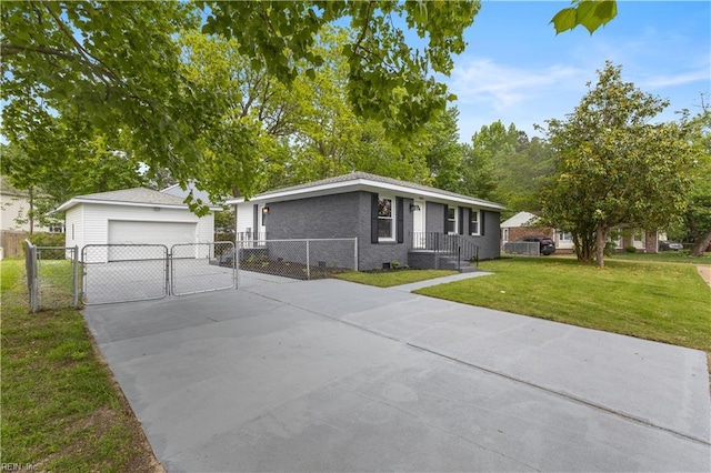 3105 Hillburn Dr, Chesapeake, VA 23323 - view of front of property with a gate, brick siding, driveway, and an outbuilding
