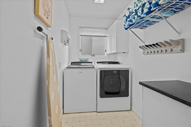 609 S Atlantic Ave, Virginia Beach, VA 23451 - laundry area featuring cabinet space, light flooring, and washing machine and clothes dryer