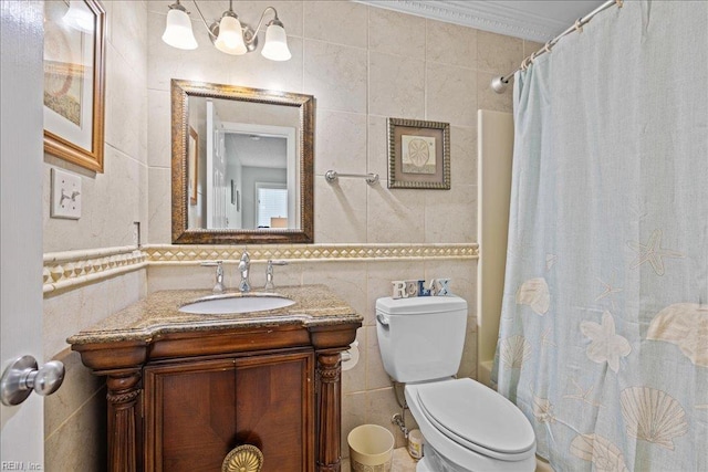609 S Atlantic Ave, Virginia Beach, VA 23451 - full bath with tile walls, vanity, toilet, and shower / tub combo with curtain