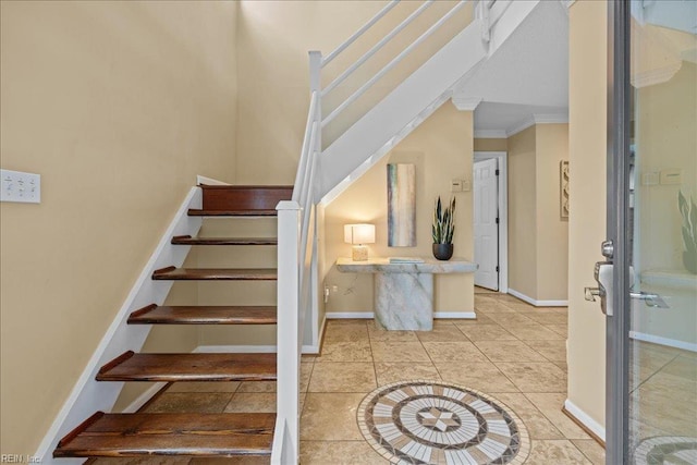 609 S Atlantic Ave, Virginia Beach, VA 23451 - stairway featuring baseboards, crown molding, and tile patterned floors