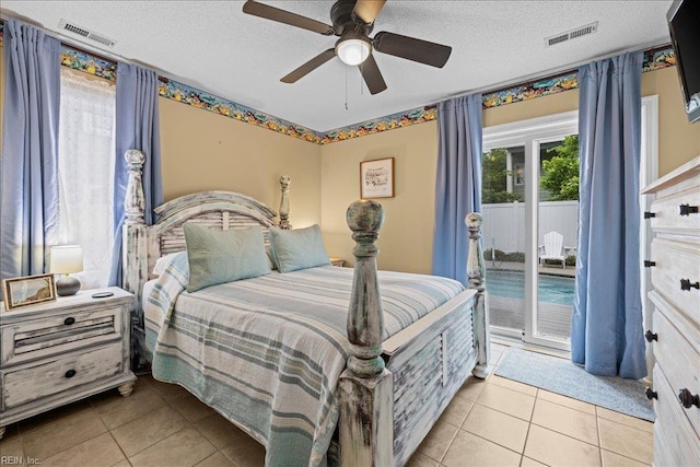 609 S Atlantic Ave, Virginia Beach, VA 23451 - bedroom with access to exterior, tile patterned floors, a textured ceiling, and a ceiling fan
