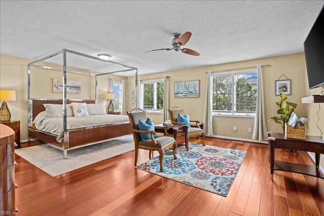 609 S Atlantic Ave, Virginia Beach, VA 23451 - bedroom with a textured ceiling and wood finished floors