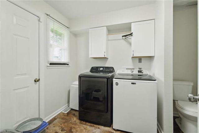 1237 Peachtree Dr, Suffolk, VA 23434 - washroom with washing machine and dryer, baseboards, and dark stone finish flooring