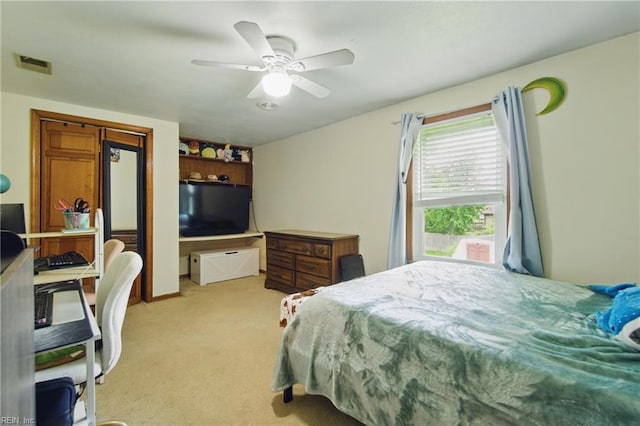 1237 Peachtree Dr, Suffolk, VA 23434 - bedroom with light colored carpet and ceiling fan