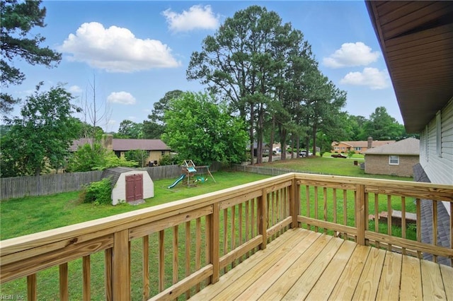 1237 Peachtree Dr, Suffolk, VA 23434 - deck with a storage unit, a playground, and an outbuilding