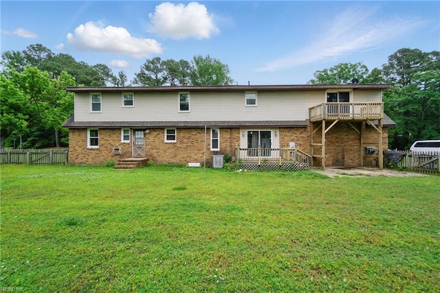 1237 Peachtree Dr, Suffolk, VA 23434 - back of property with brick siding, central AC, and a deck