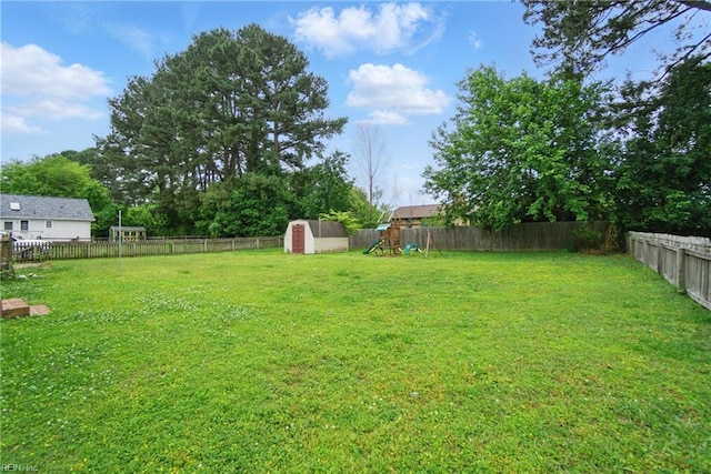 1237 Peachtree Dr, Suffolk, VA 23434 - view of yard with a playground, a shed, and an outdoor structure