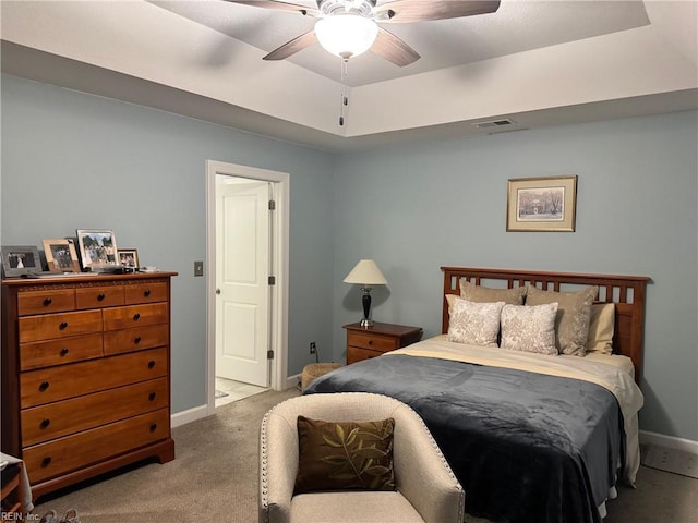5305 Sports Club Run Unit 403, Suffolk, VA 23435 - carpeted bedroom featuring baseboards, a tray ceiling, and ceiling fan